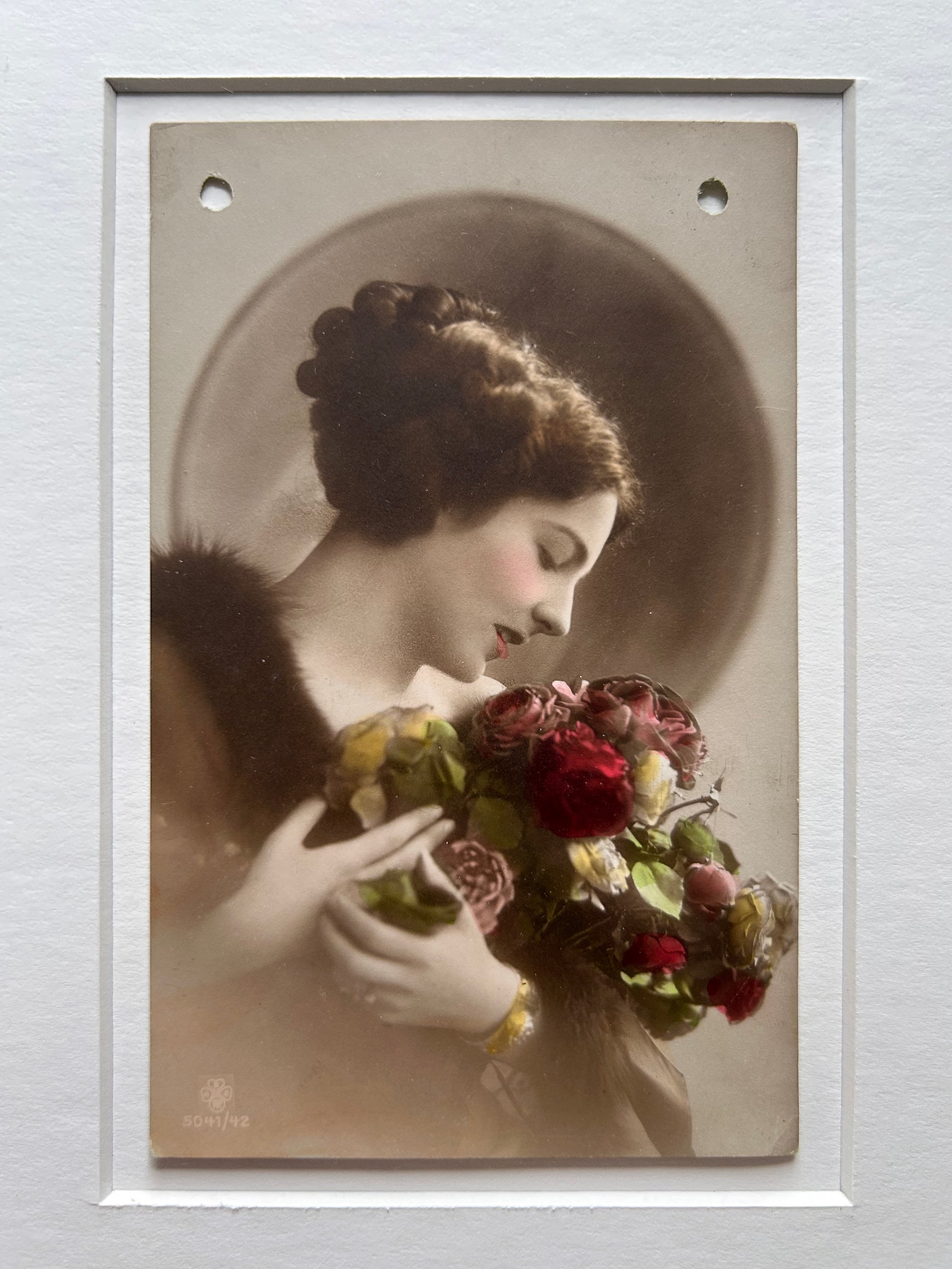 By any other name - Framed 1920s Hand-Colored Postcard with a Vintage soft portrait of a woman holding flowers Parisian Portrait in a handmade Merbau wood Frame
