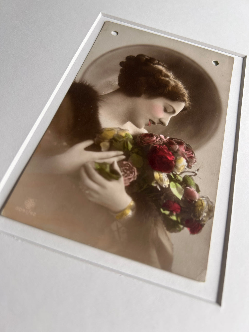 By any other name - Framed 1920s Hand-Colored Postcard with a Vintage soft portrait of a woman holding flowers Parisian Portrait in a handmade Merbau wood Frame