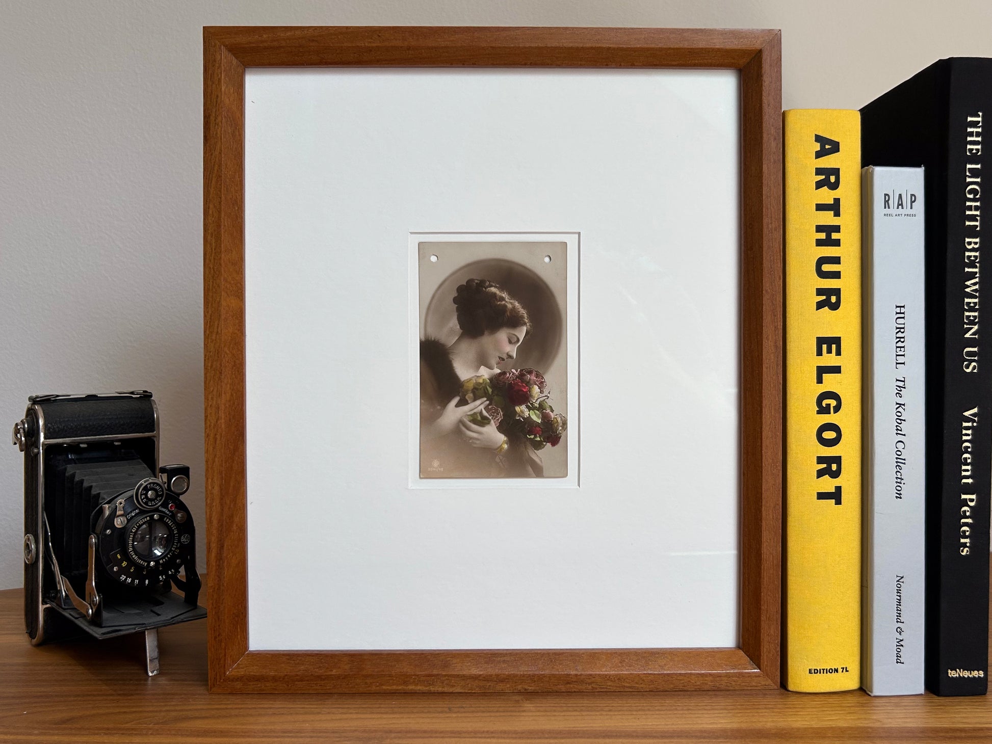 By any other name - Framed 1920s Hand-Colored Postcard with a Vintage soft portrait of a woman holding flowers Parisian Portrait in a handmade Merbau wood Frame