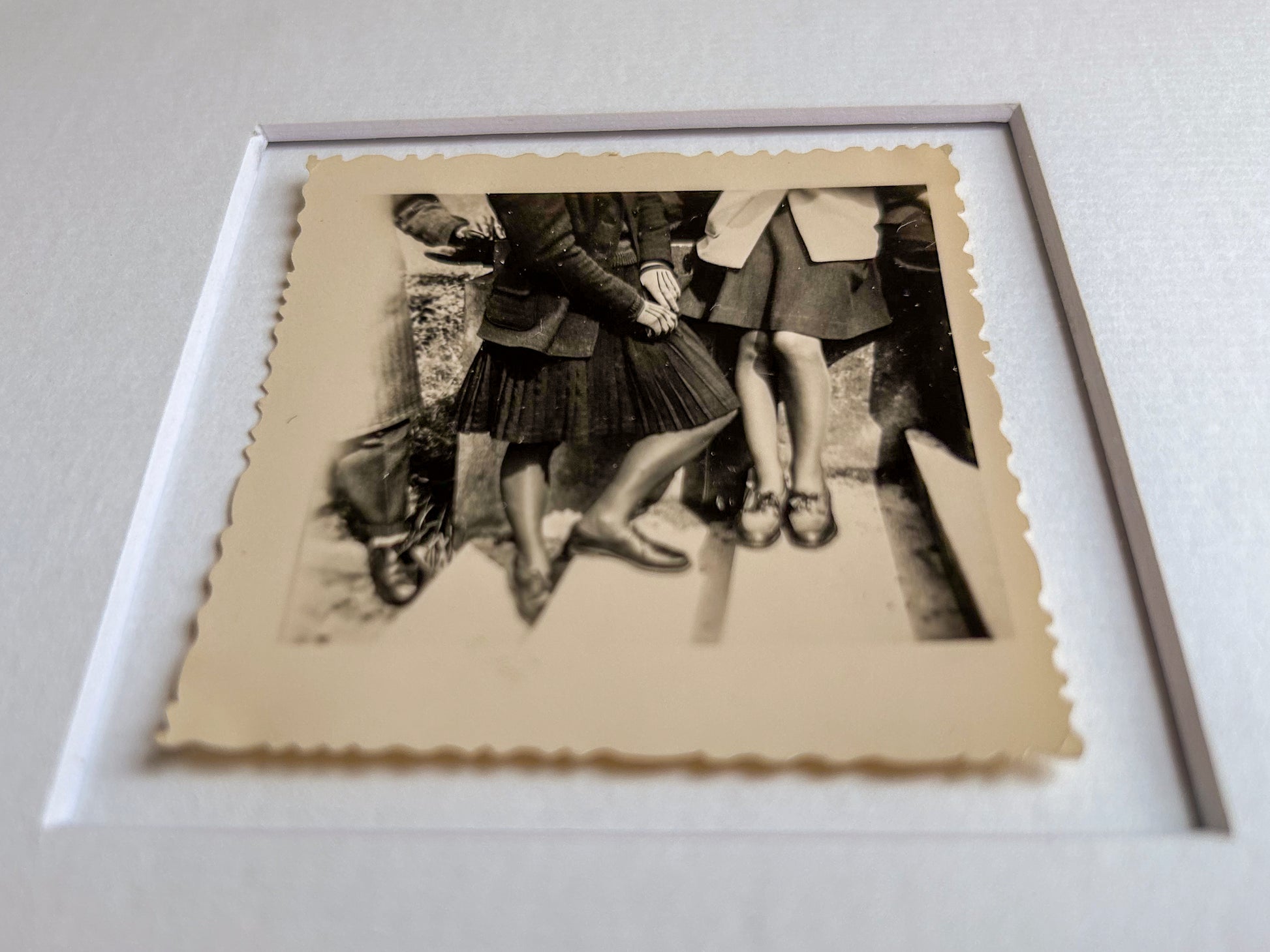 Hearing what isn't said - Framed vintage unique portrait photograph of a group of people on stairs in 1940's period clothing and shoes