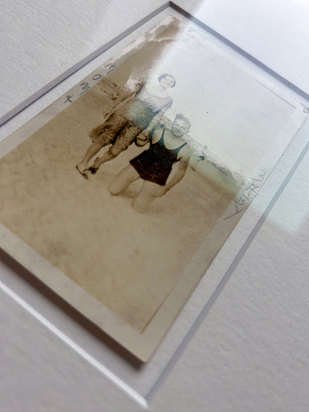 Mom + baby - Framed 1950s B&W "Mom + Baby" Photo featuring a standing woman and a man on his knees – Vintage Silver Gelatin Print in Custom Frame