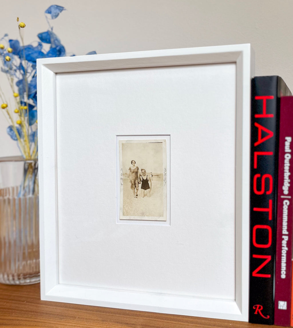 Mom + baby - Framed 1950s B&W "Mom + Baby" Photo featuring a standing woman and a man on his knees – Vintage Silver Gelatin Print in Custom Frame