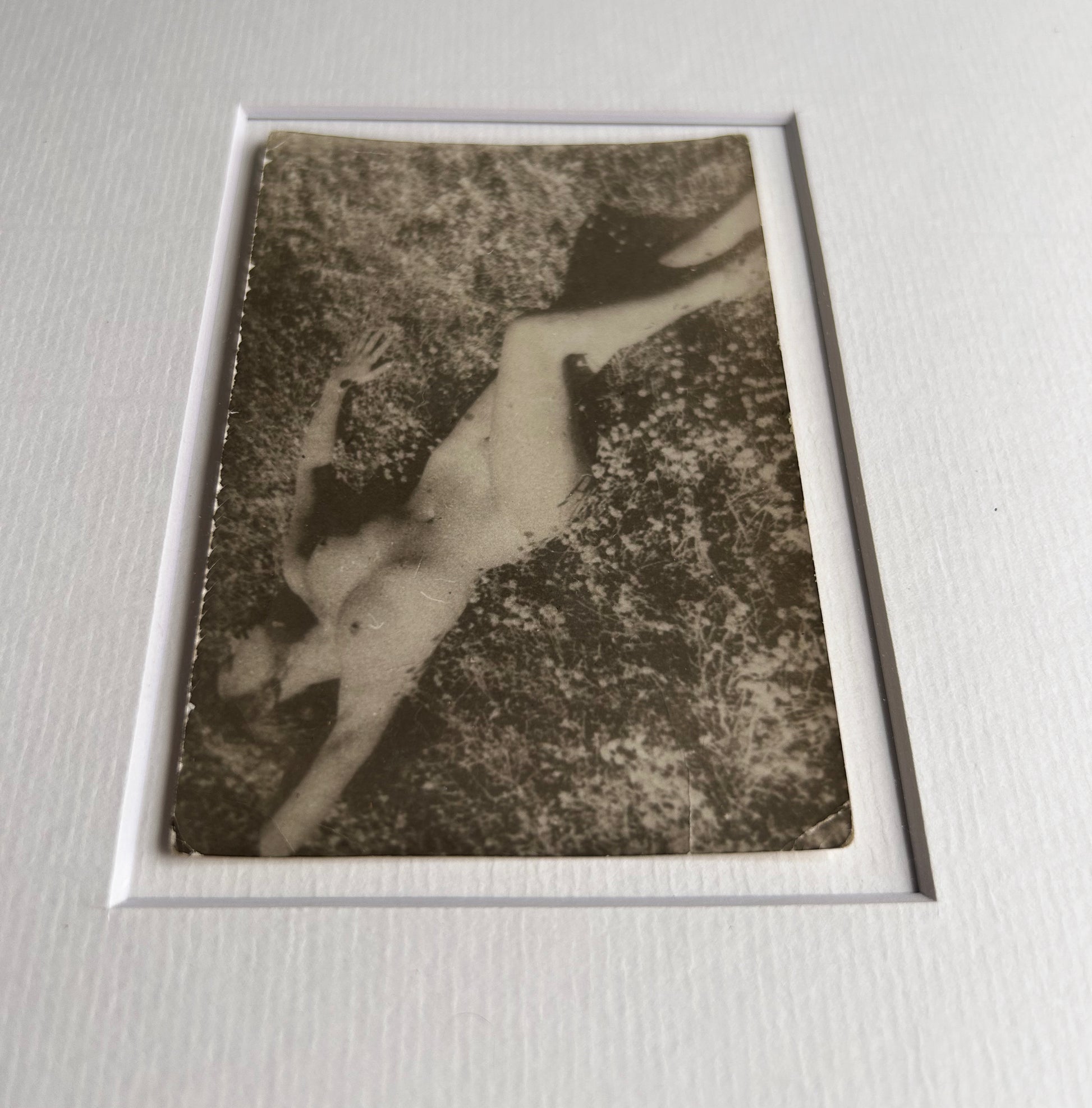 Unarmed - Framed Vintage Nude Photo – 1950s Outdoor Reclining Figure in Jatoba Wood