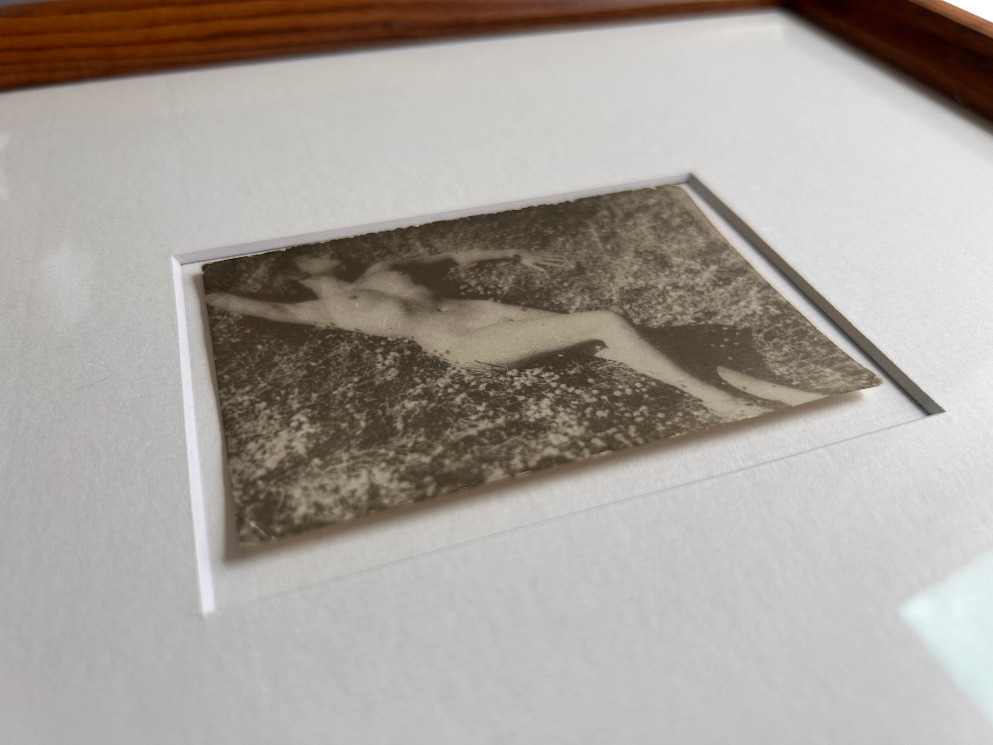 Unarmed - Framed Vintage Nude Photo – 1950s Outdoor Reclining Figure in Jatoba Wood