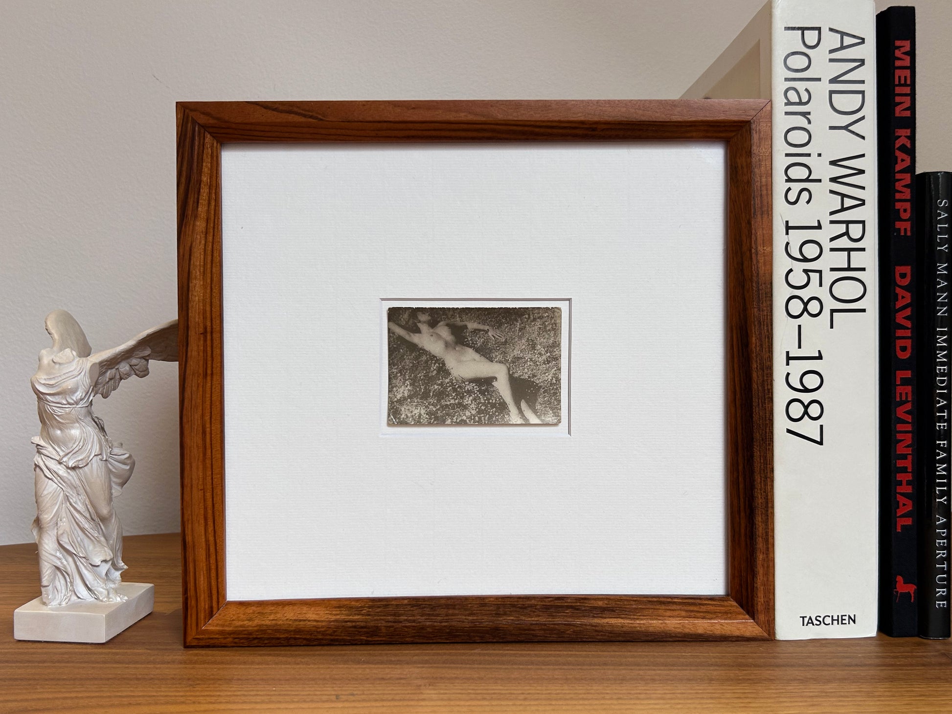 Unarmed - Framed Vintage Nude Photo – 1950s Outdoor Reclining Figure in Jatoba Wood