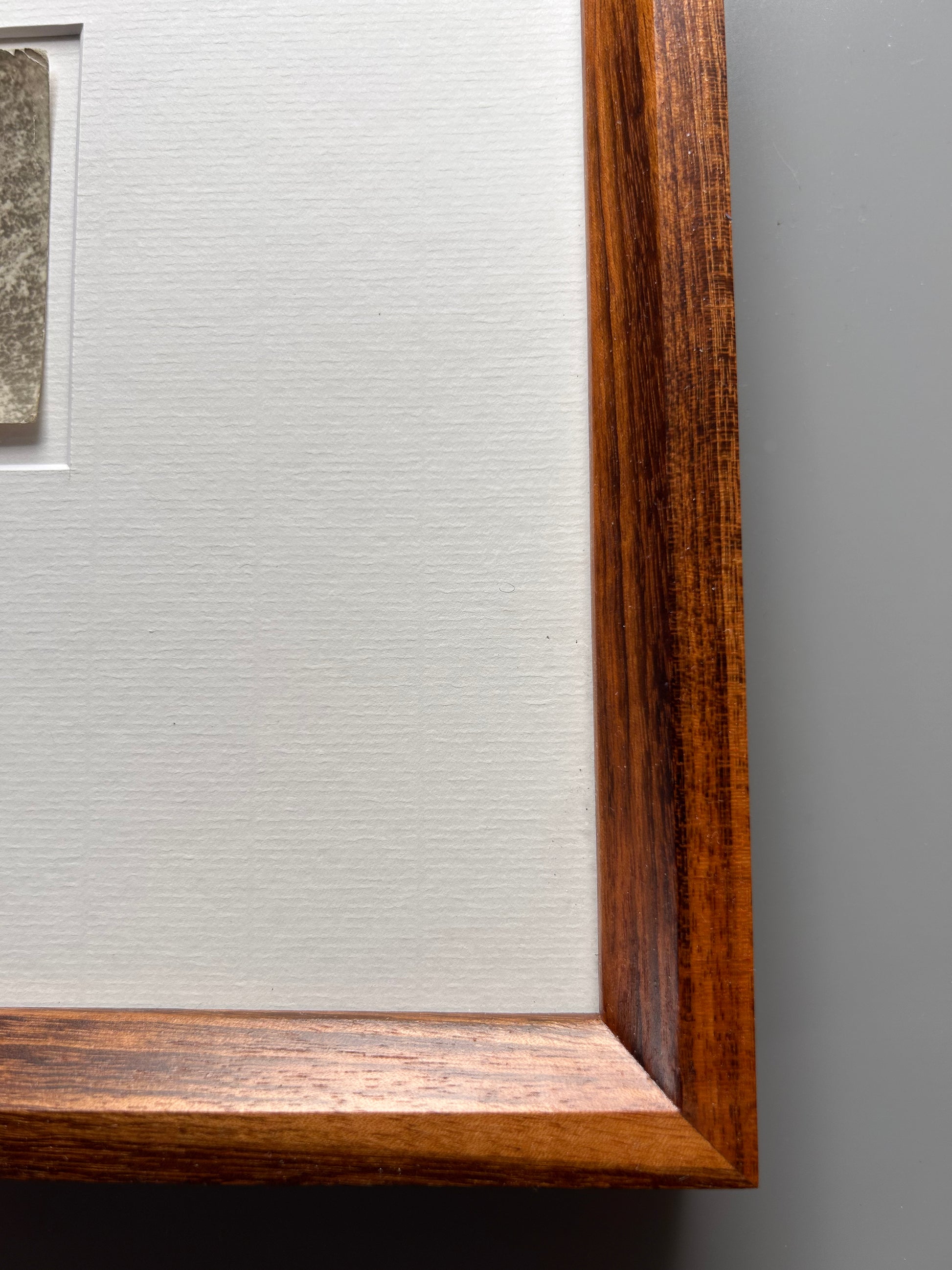Unarmed - Framed Vintage Nude Photo – 1950s Outdoor Reclining Figure in Jatoba Wood