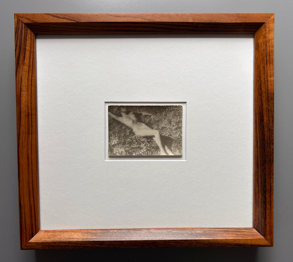 Unarmed - Framed Vintage Nude Photo – 1950s Outdoor Reclining Figure in Jatoba Wood