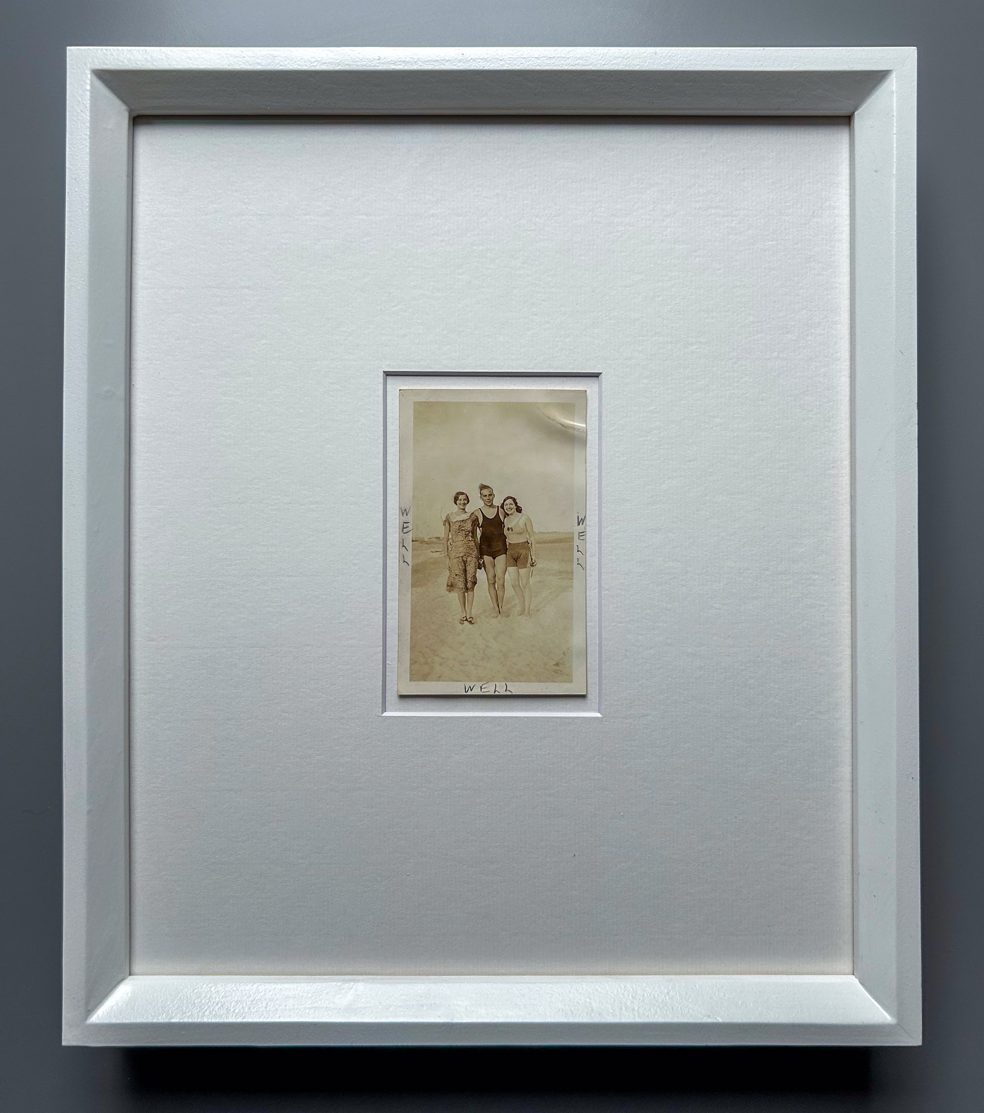 Well, well, well - handmade Framed Vintage Photo featuring a man standing with two women with handwritten Text – 1950s B&W Art Print: "Well Well Well"