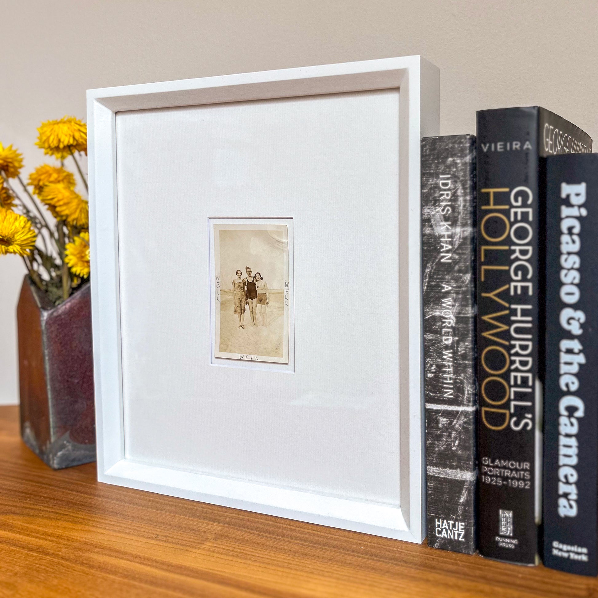 Well, well, well - handmade Framed Vintage Photo featuring a man standing with two women with handwritten Text – 1950s B&W Art Print: "Well Well Well"