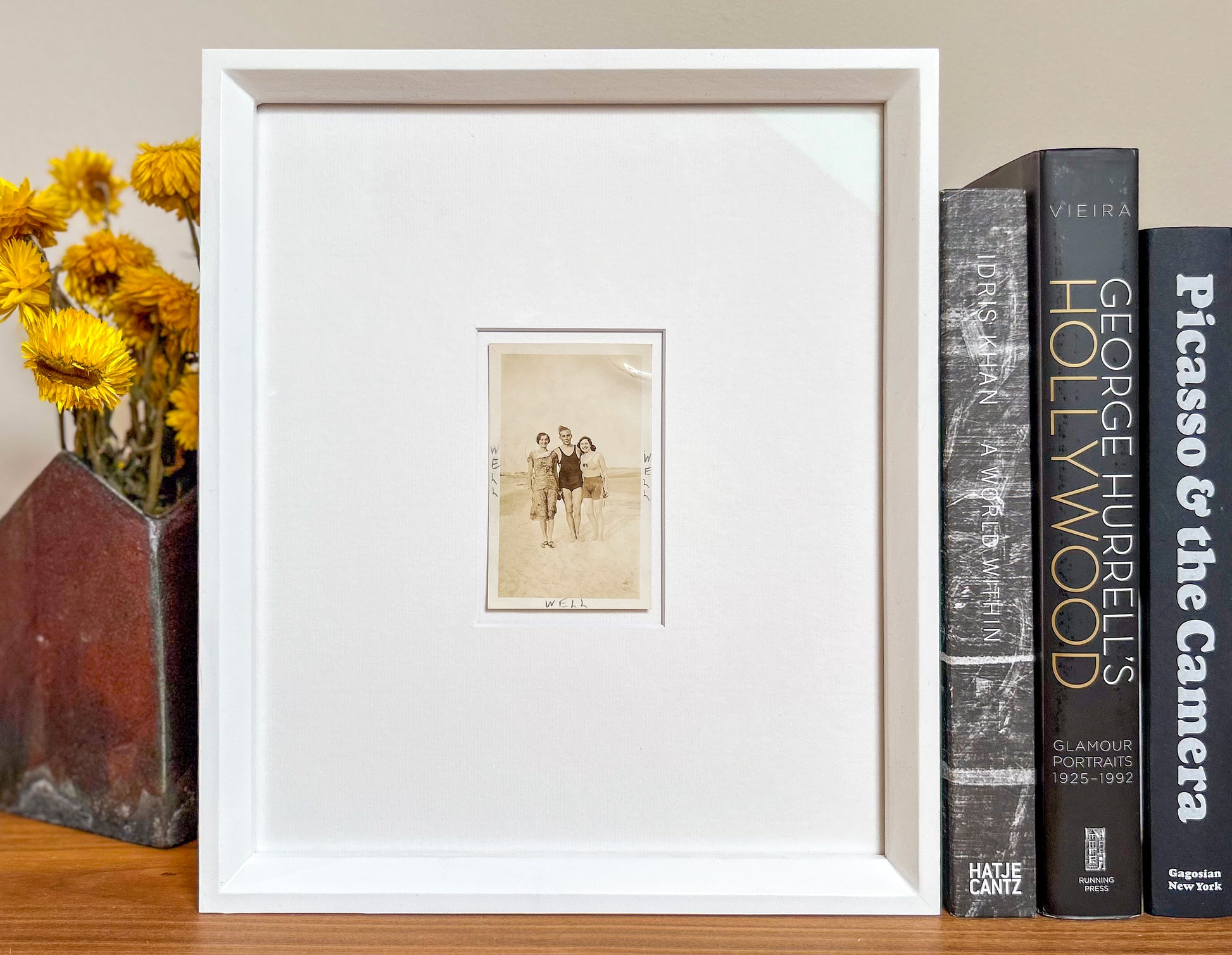 Well, well, well - handmade Framed Vintage Photo featuring a man standing with two women with handwritten Text – 1950s B&W Art Print: "Well Well Well"