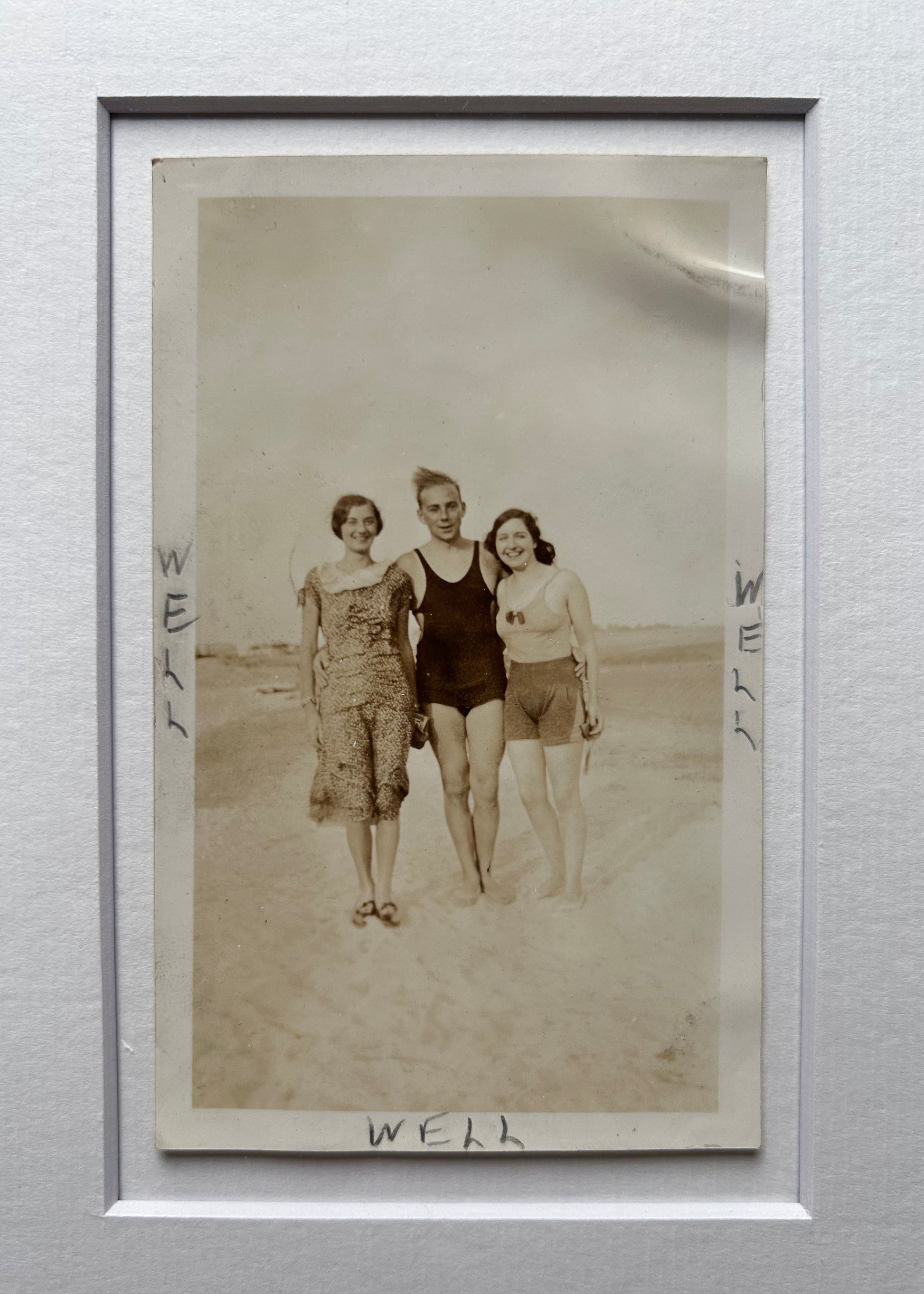 Well, well, well - handmade Framed Vintage Photo featuring a man standing with two women with handwritten Text – 1950s B&W Art Print: "Well Well Well"